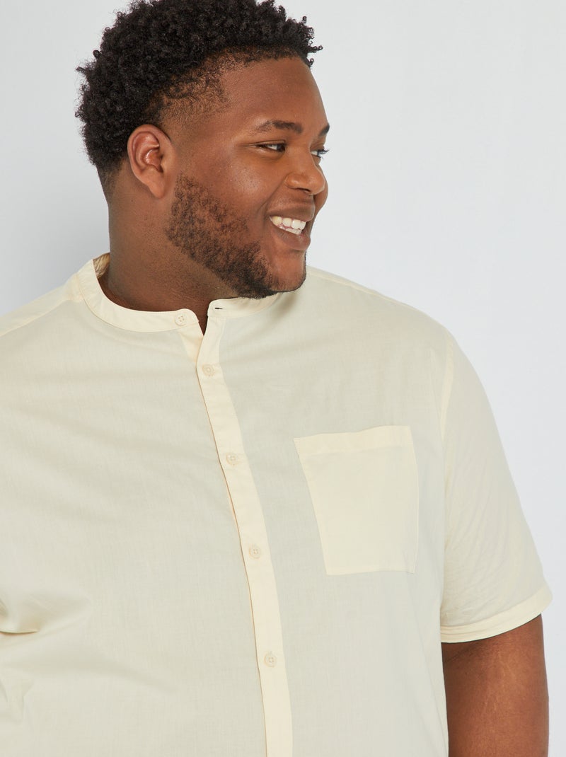Camicia da donna bianca con collo alla coreana
