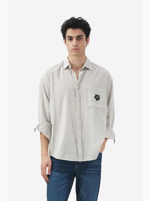 Camicia in cotone a righe con trama in velluto giesto - Kiabi Camicia in cotone a righe con trama in velluto giesto - Kiabi