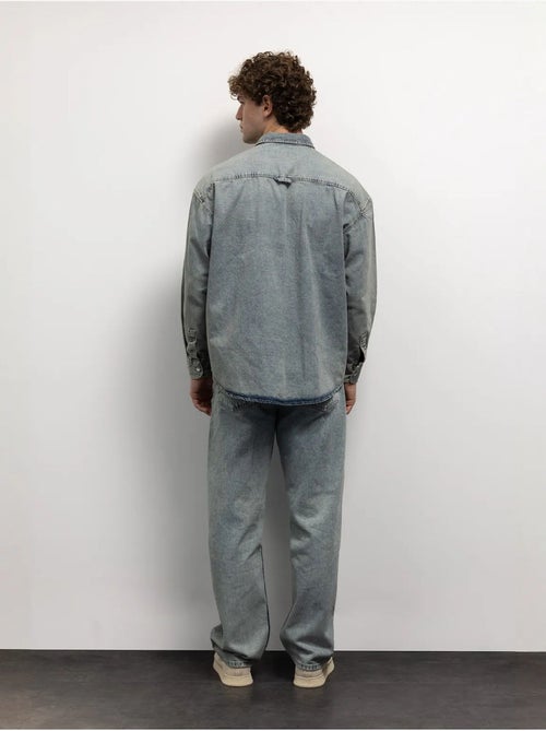 Camicia in denim regular fit con bottoni e tasca giesto - Kiabi Camicia in denim regular fit con bottoni e tasca giesto - Kiabi