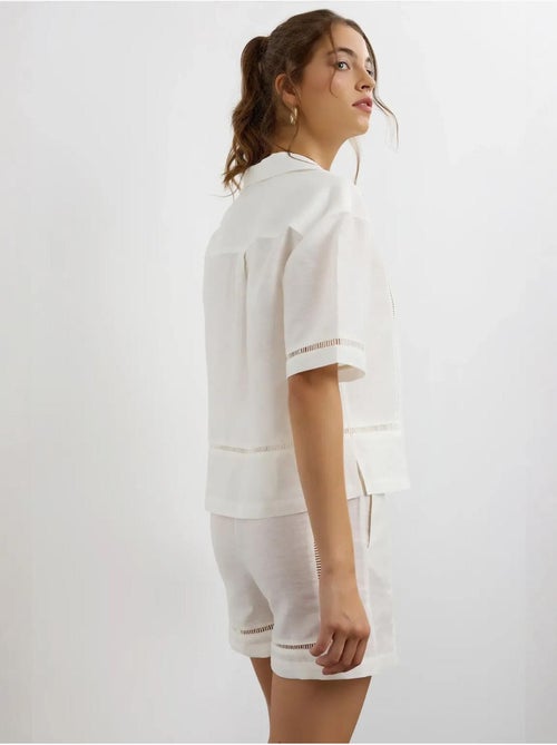 Camicia in lino a maniche corte con dettaglio cut-out hiccup - Kiabi Camicia in lino a maniche corte con dettaglio cut-out hiccup - Kiabi