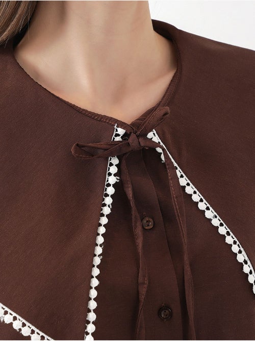 Camicia in popeline con colletto baby e fiocco bdart - Kiabi Camicia in popeline con colletto baby e fiocco bdart - Kiabi