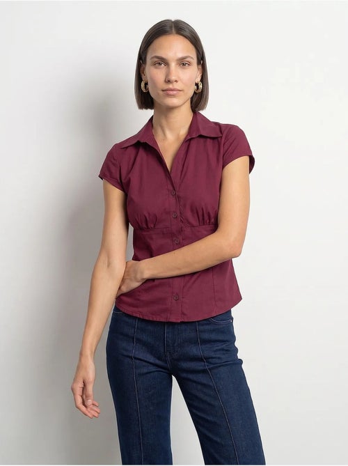 Camicia in popeline di cotone aderente con dettaglio a laccio dilvin - Kiabi Camicia in popeline di cotone aderente con dettaglio a laccio dilvin - Kiabi