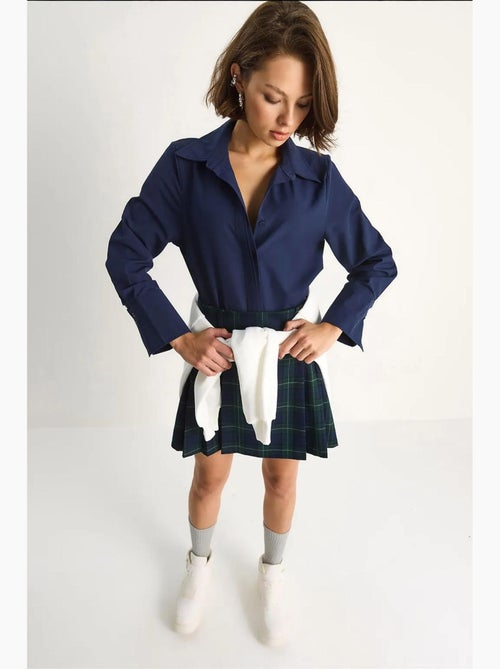 Camicia in popeline regular fit a maniche lunghe con abbottonatura lucci - Kiabi Camicia in popeline regular fit a maniche lunghe con abbottonatura lucci - Kiabi