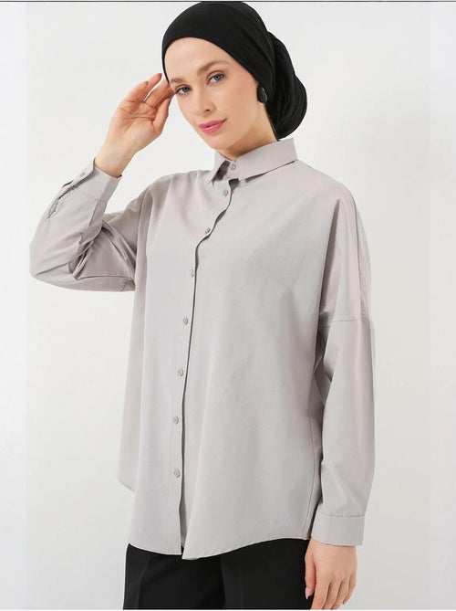 Camicia in popeline relaxed fit con chiusura a bottoni bdart - Kiabi Camicia in popeline relaxed fit con chiusura a bottoni bdart - Kiabi