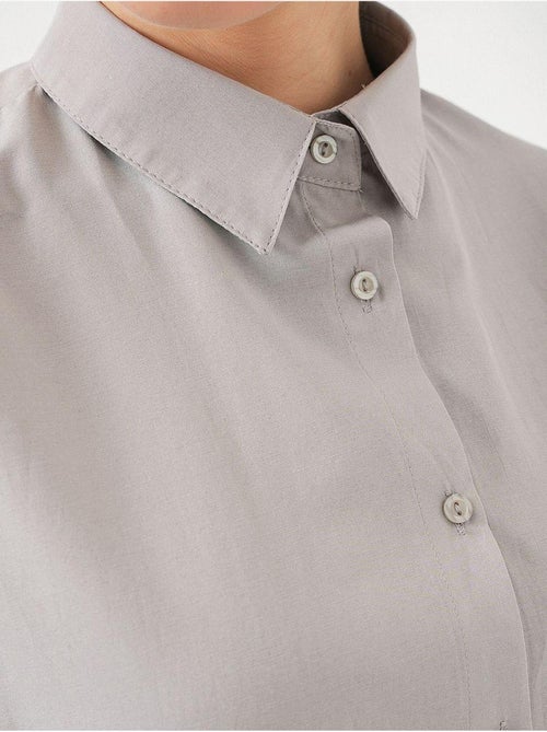 Camicia in popeline relaxed fit con chiusura a bottoni bdart - Kiabi Camicia in popeline relaxed fit con chiusura a bottoni bdart - Kiabi