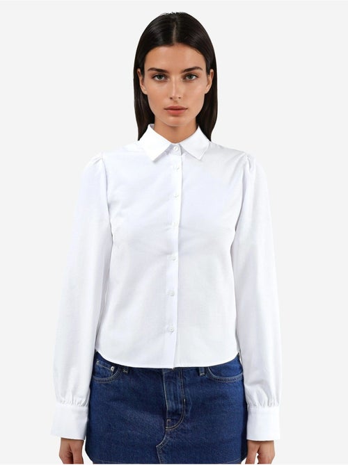 Camicia in popeline tinta unita con chiusura a bottoni busem - Kiabi Camicia in popeline tinta unita con chiusura a bottoni busem - Kiabi