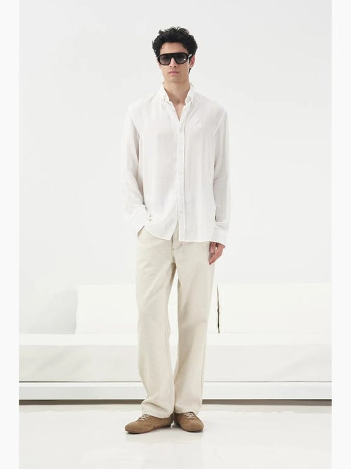 Camicia in tencel tinta unita con bottoni giesto - Kiabi Camicia in tencel tinta unita con bottoni giesto - Kiabi