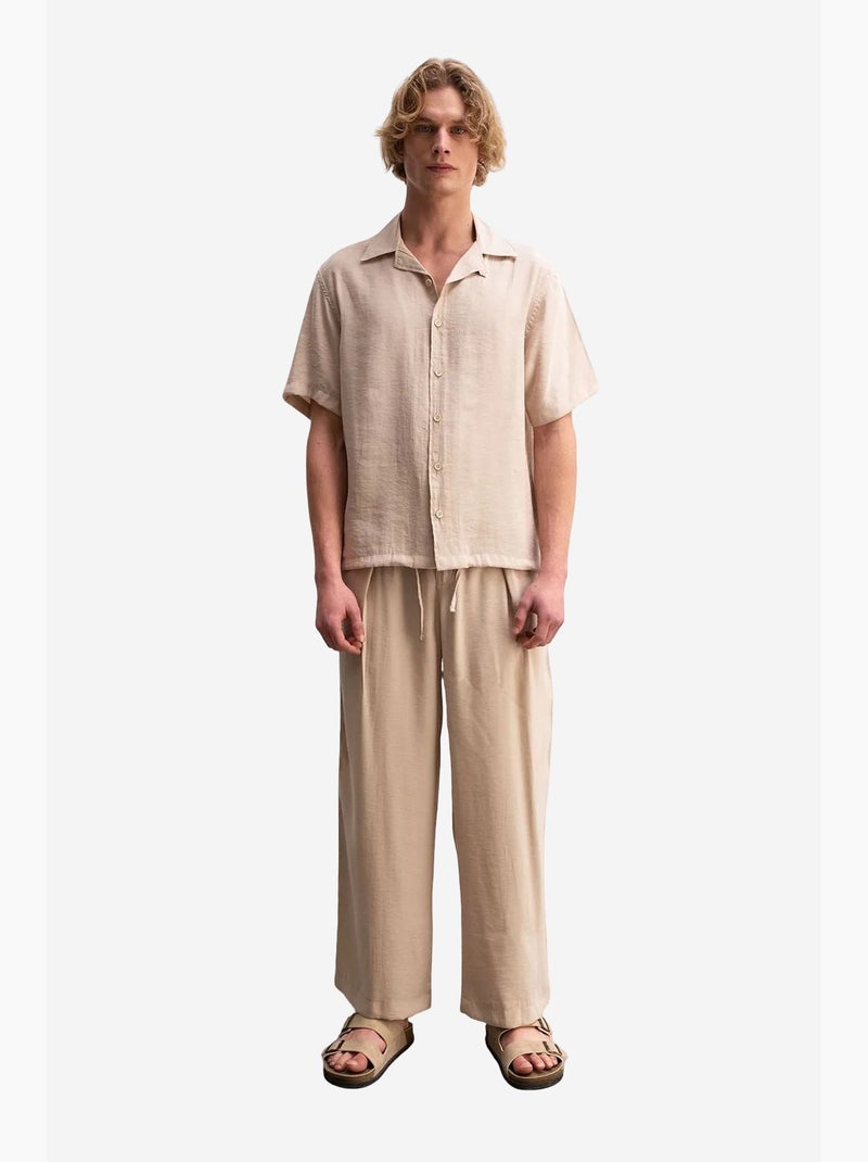 Camicia in tessuto a maniche corte dal taglio rilassato con dettaglio cravatta giesto Beige naturale - Kiabi