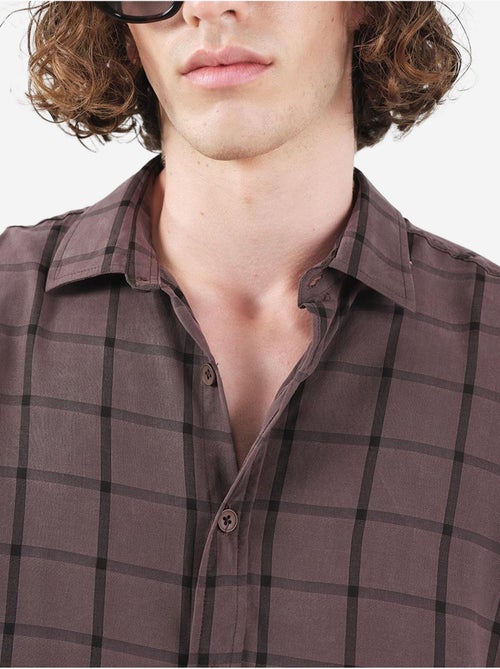 Camicia oversize a quadri con bottoni giesto - Kiabi Camicia oversize a quadri con bottoni giesto - Kiabi