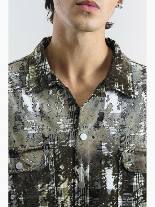 Camicia oversize a quadri testurizzata con tasca giesto - Kiabi Camicia oversize a quadri testurizzata con tasca giesto - Kiabi