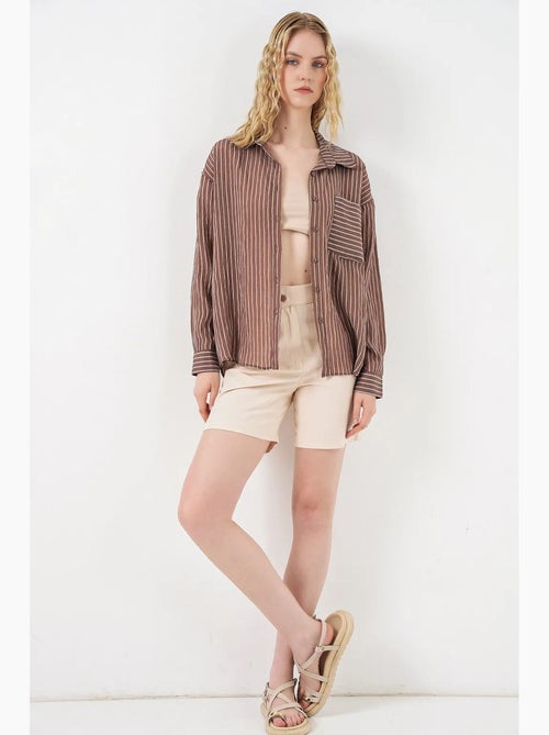 Camicia oversize a righe con abbottonatura frontale bdart - Kiabi Camicia oversize a righe con abbottonatura frontale bdart - Kiabi