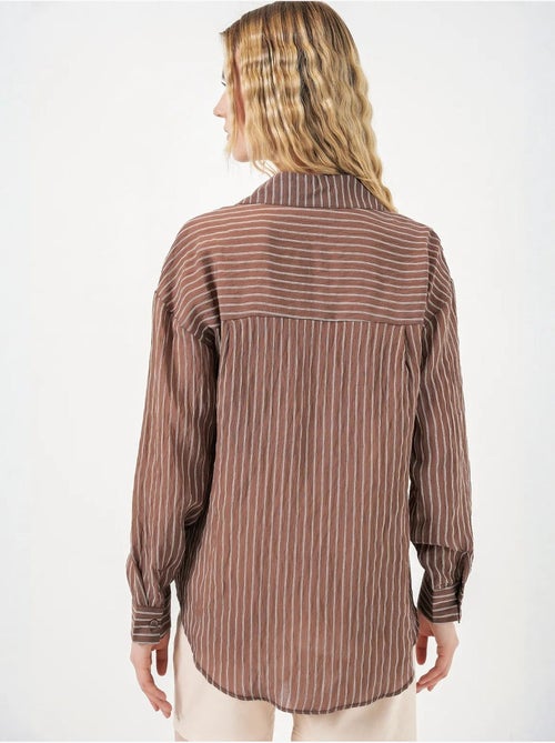 Camicia oversize a righe con abbottonatura frontale bdart - Kiabi Camicia oversize a righe con abbottonatura frontale bdart - Kiabi