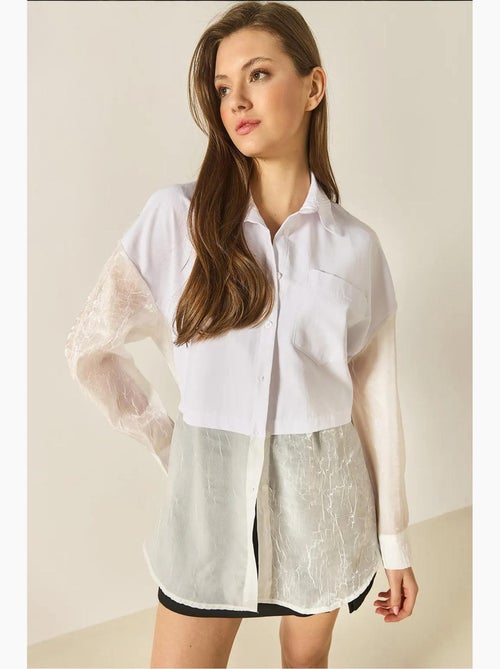 Camicia oversize con dettagli in tulle e organza lucci - Kiabi Camicia oversize con dettagli in tulle e organza lucci - Kiabi