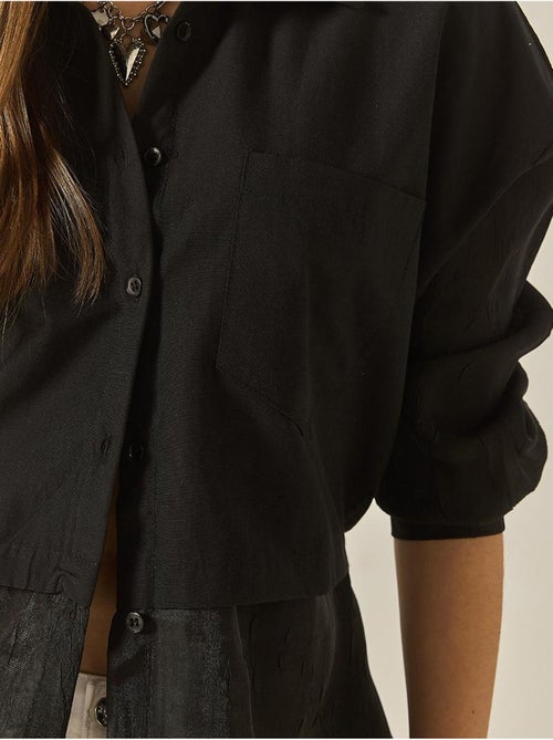 Camicia oversize con dettagli in tulle e organza lucci - Kiabi Camicia oversize con dettagli in tulle e organza lucci - Kiabi