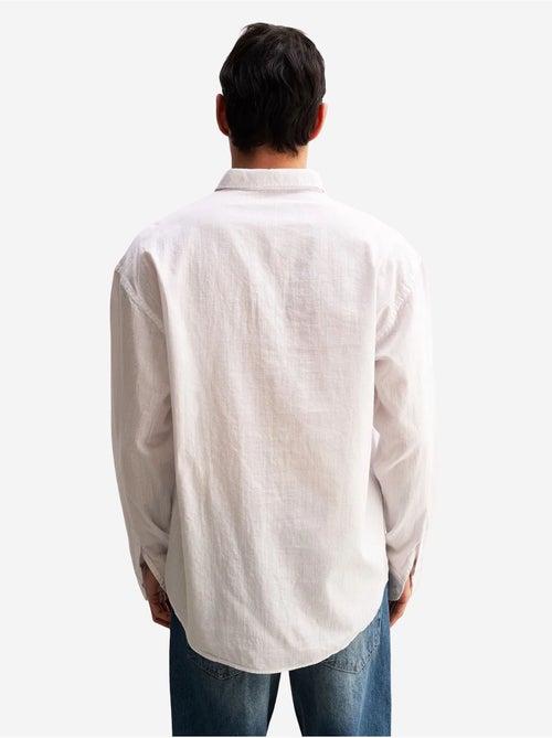 Camicia oversize in cotone con bottoni giesto - Kiabi Camicia oversize in cotone con bottoni giesto - Kiabi