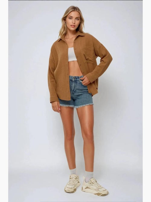 Camicia oversize in cotone con dettaglio tasca hiccup - Kiabi Camicia oversize in cotone con dettaglio tasca hiccup - Kiabi