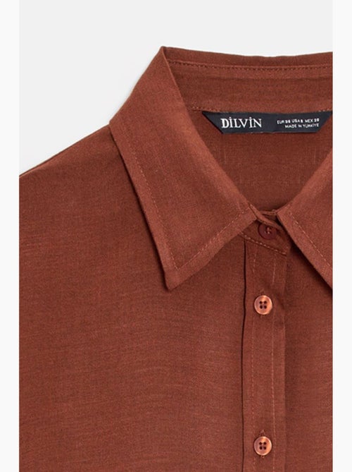 Camicia oversize in crêpe con bottoni dilvin - Kiabi Camicia oversize in crêpe con bottoni dilvin - Kiabi