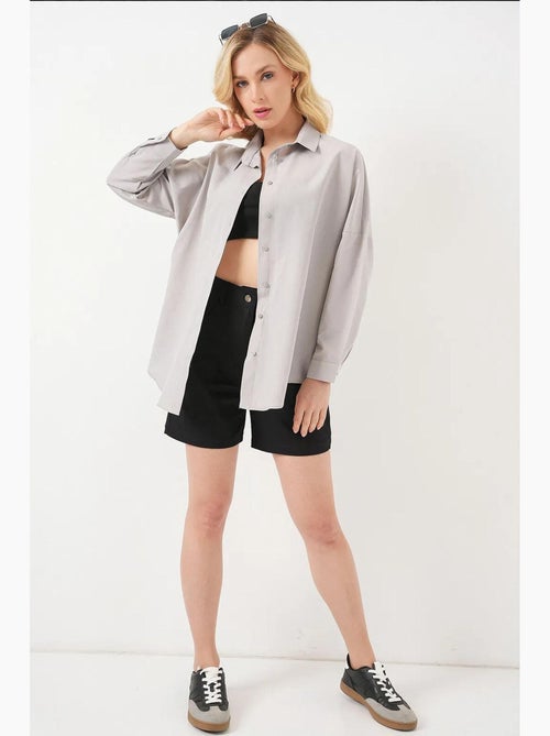 Camicia oversize in popeline con motivo e bottoni bdart - Kiabi Camicia oversize in popeline con motivo e bottoni bdart - Kiabi