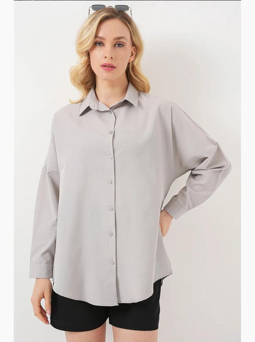 Camicia oversize in popeline con motivo e bottoni bdart - Kiabi Camicia oversize in popeline con motivo e bottoni bdart - Kiabi