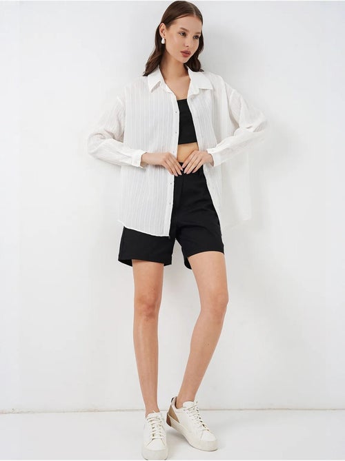 Camicia oversize testurizzata a righe con chiusura a bottoni bdart - Kiabi Camicia oversize testurizzata a righe con chiusura a bottoni bdart - Kiabi