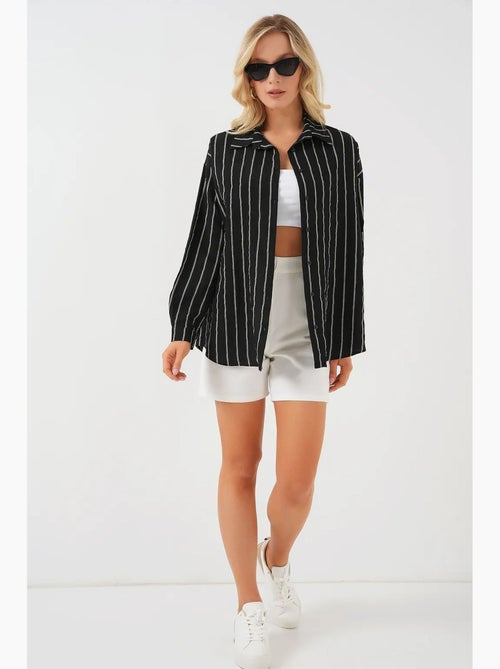 Camicia oversize testurizzata a righe con chiusura a bottoni bdart - Kiabi Camicia oversize testurizzata a righe con chiusura a bottoni bdart - Kiabi