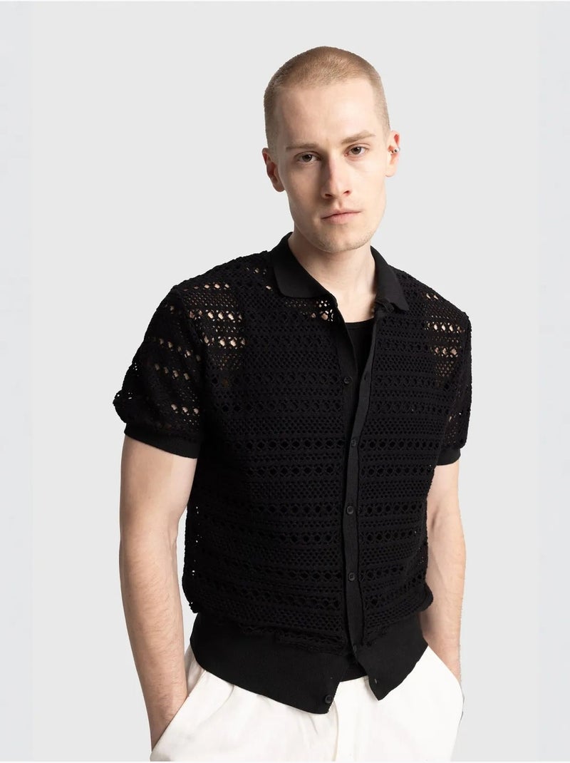 Camicia polo in maglia testurizzata con chiusura a bottoni giesto Nero - Kiabi