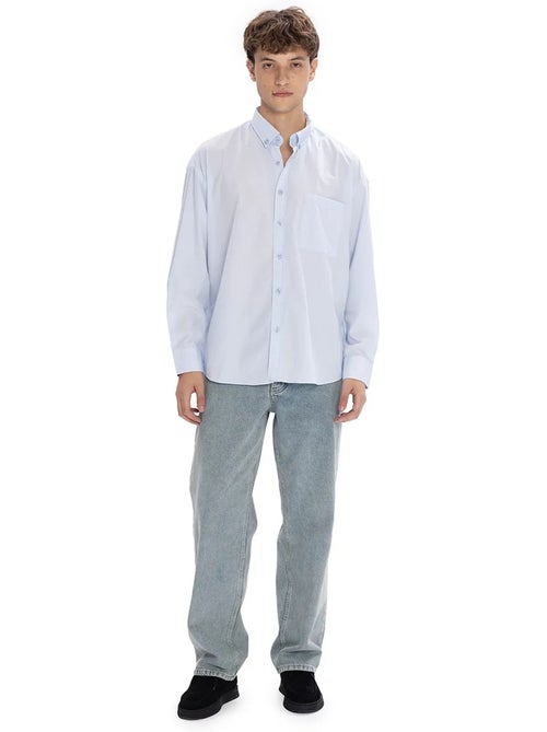 Camicia regular fit con colletto button-down e taschino giesto - Kiabi Camicia regular fit con colletto button-down e taschino giesto - Kiabi