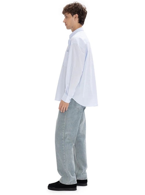 Camicia regular fit con colletto button-down e taschino giesto - Kiabi Camicia regular fit con colletto button-down e taschino giesto - Kiabi