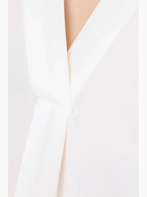 Camicia senza maniche semitrasparente con scollo a v hiccup - Kiabi Camicia senza maniche semitrasparente con scollo a v hiccup - Kiabi