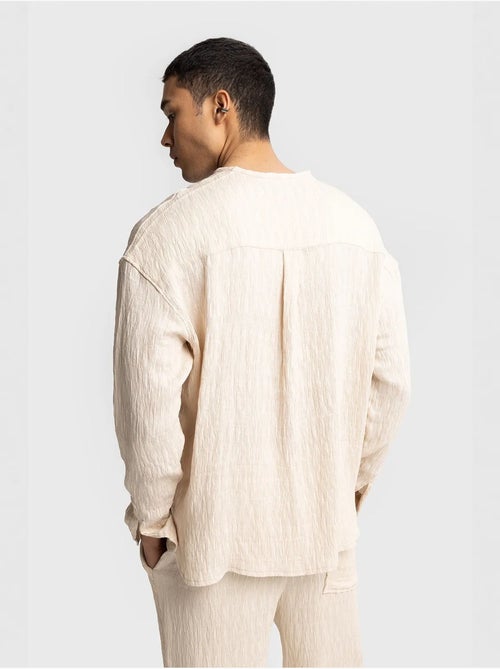Camicia testurizzata a maniche lunghe con girocollo giesto - Kiabi Camicia testurizzata a maniche lunghe con girocollo giesto - Kiabi