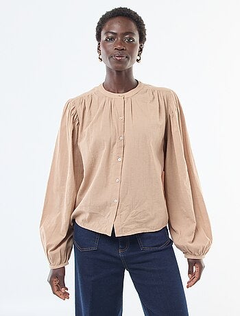 Camicia tinta unita con maniche lunghe a sbuffo