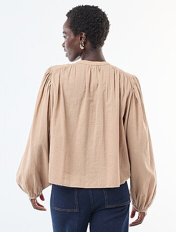 Camicia tinta unita con maniche lunghe a sbuffo