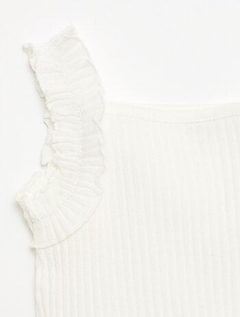 Canotta a costine a punto traforato con spalline a volant