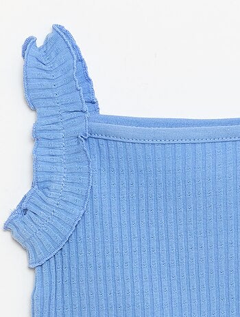 Canotta a costine a punto traforato con spalline a volant