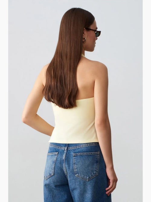 Canotta aderente halter con cut-out dilvin - Kiabi Canotta aderente halter con cut-out dilvin - Kiabi