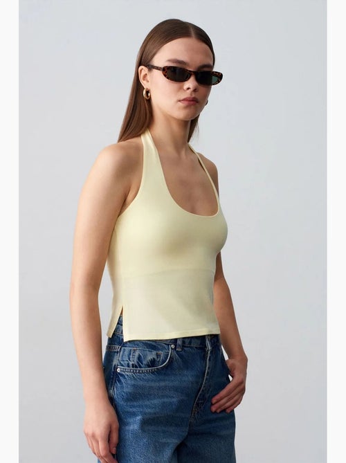 Canotta aderente halter con cut-out dilvin - Kiabi Canotta aderente halter con cut-out dilvin - Kiabi