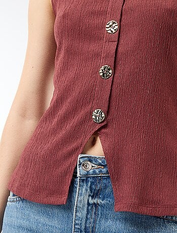 Canotta con apertura con bottoni dorati martellati