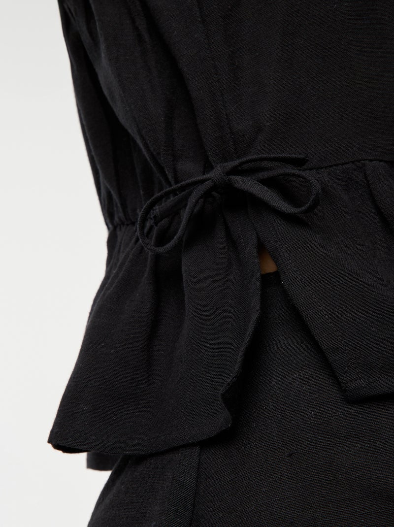 Canotta con spalline sottili e motivo nero - Kiabi