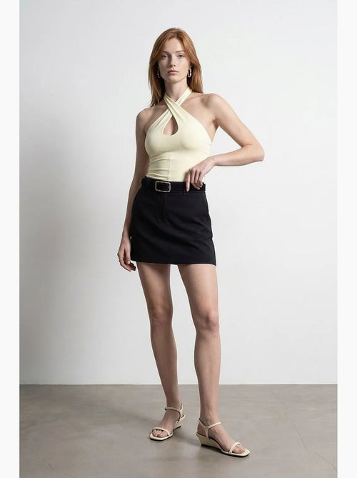 Canotta corta halter con cut-out dilvin - Kiabi Canotta corta halter con cut-out dilvin - Kiabi