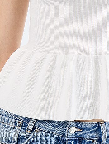 Canotta peplum in maglia a costine