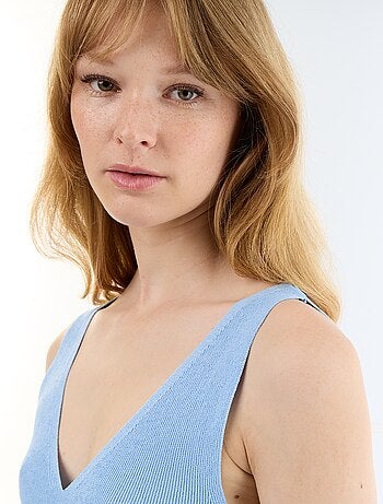 Canotta peplum in maglia a costine