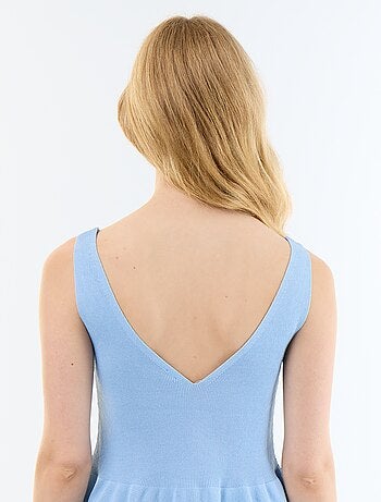 Canotta peplum in maglia a costine