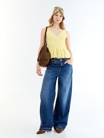 Canotta peplum in maglia a costine