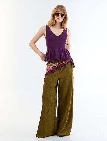 Canotta peplum in maglia a costine