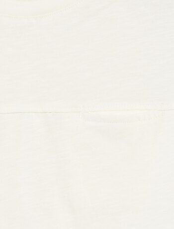 Canotta taglio loose con cut-out sul petto