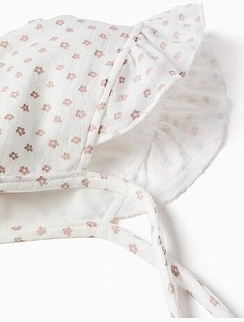 Cappellino in cotone con motivo floreale e laccetti