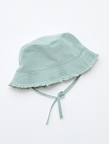Cappello a secchiello a tinta unita con frange e laccetti in cotone