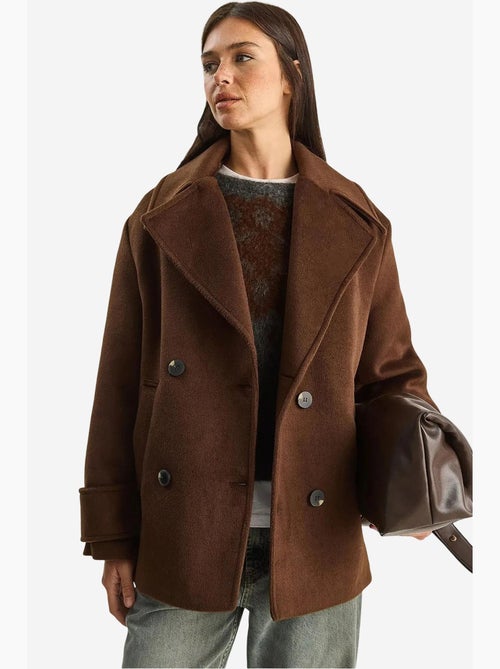 Cappotto oversize con tasche lucci - Kiabi Cappotto oversize con tasche lucci - Kiabi