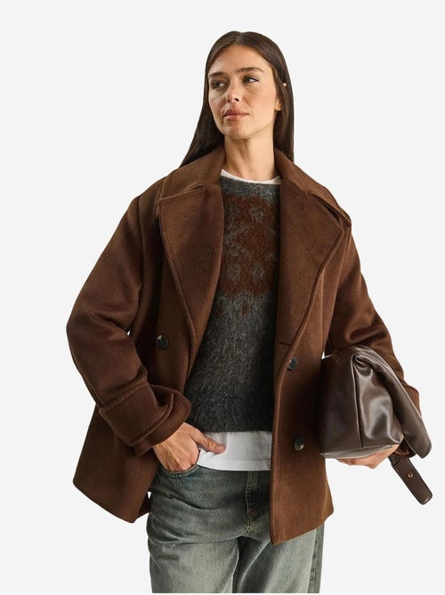 Cappotto oversize con tasche lucci - Kiabi Cappotto oversize con tasche lucci - Kiabi