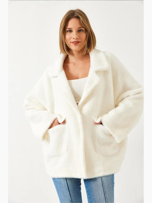 Cappotto oversize in pelliccia sintetica lucci - Kiabi Cappotto oversize in pelliccia sintetica lucci - Kiabi